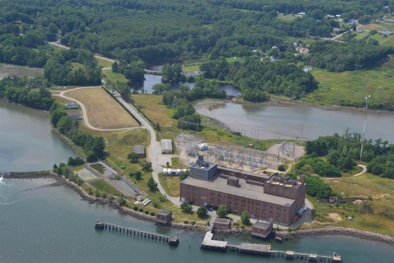 Mason Station, the former steam-electric generating plant that once housed five turbo generators and a maze of equipment that produced needed electricity during World War II, sits idle on the shores of the Sheepscot River with its interior being dismantled and shipped to Guatemala. Photo Courtesy of Karl Marean 